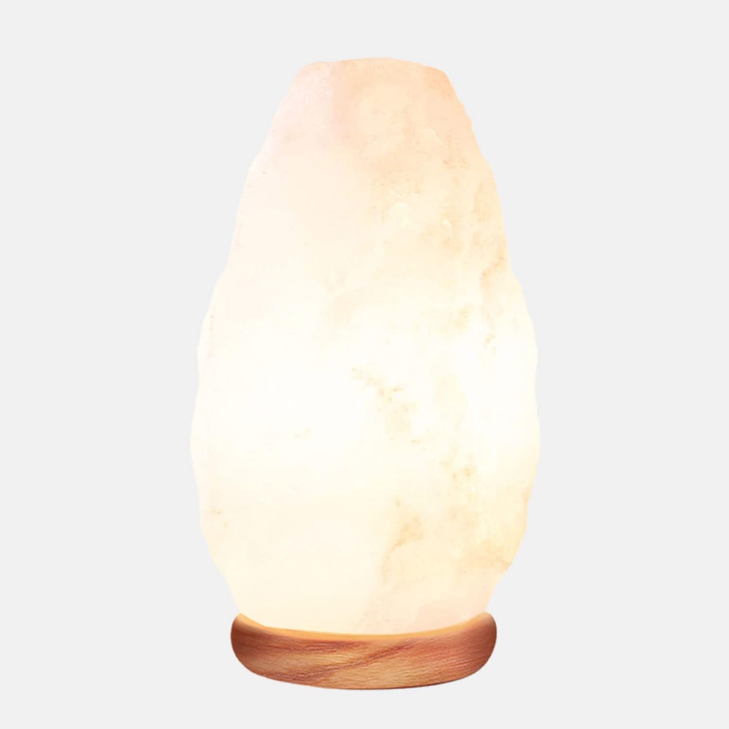 Illuminated Himalayan salt lamp on wooden base.