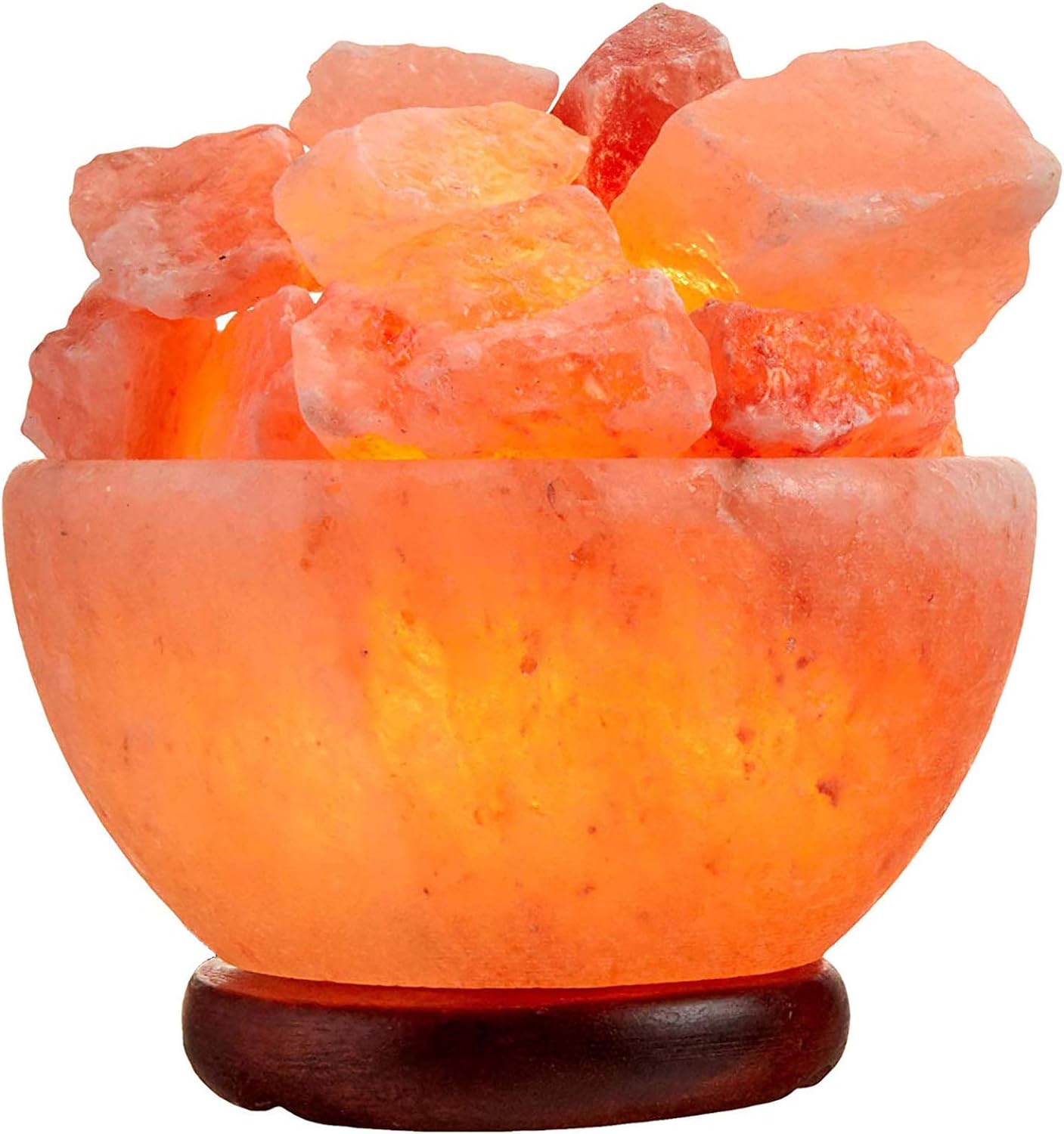 Illuminated Himalayan salt lamp on wooden base.